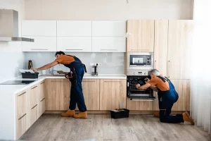 two-handymen-workers-uniform-fixing-600nw-1780272533